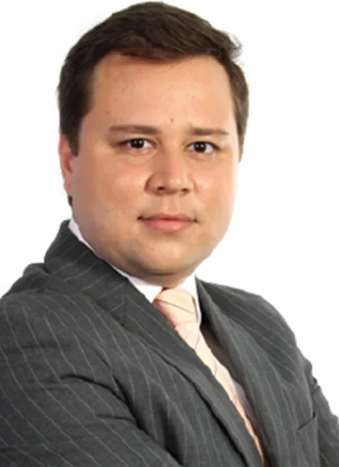 Foto do Prof. Dr. Felipe Asensi, de terno e gravata.